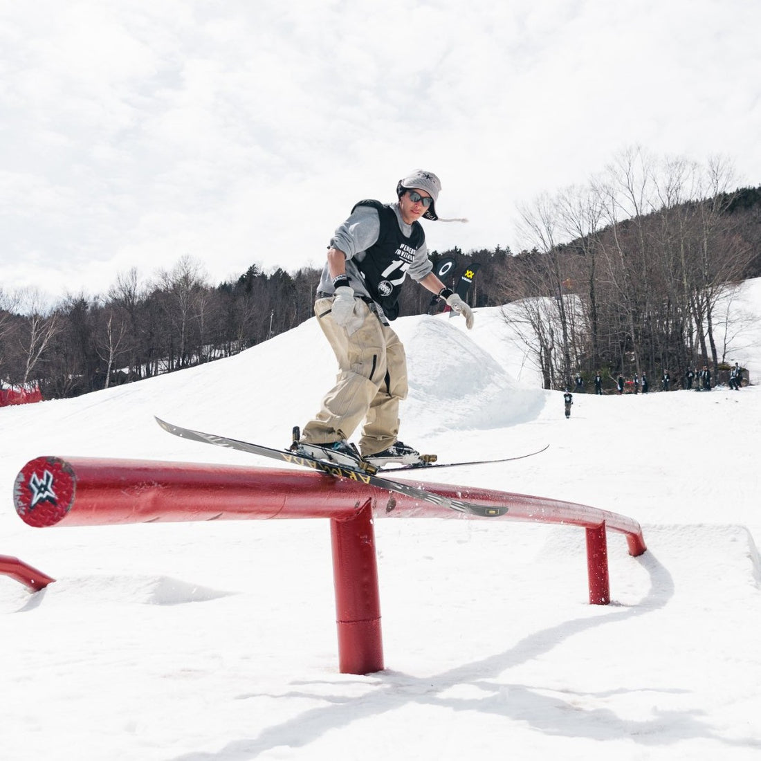 Skier wearing the Sand Jabree Peruvian Earflap Beanie on a rail