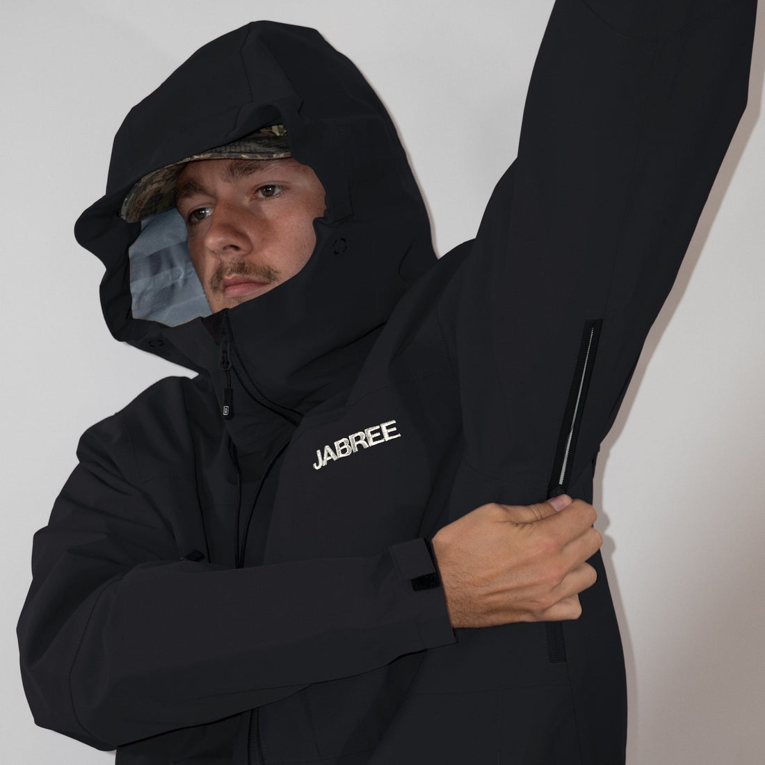 Midnight Black Jabshell Jacket, pit zip open, hood up
